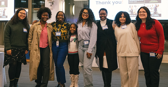 A group of students and mentors celebrating the launch of a health career program at UMass Chan Medical School.