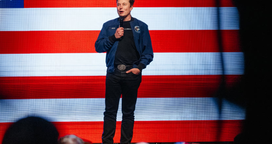 Elon Musk speaking during a video interview at the Qatar Economic Forum, 2025