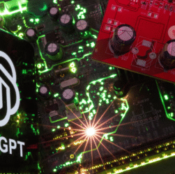 A smartphone showing the ChatGPT logo rests atop a computer motherboard.