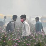 Children wearing masks in Delhi to protect against toxic air pollution, with parents worried about respiratory health.