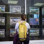 Aerial view of UK residential neighbourhood with mixed property values, representing potential council tax reform