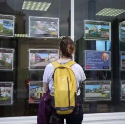 Aerial view of UK residential neighbourhood with mixed property values, representing potential council tax reform