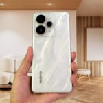 Leaked Realme 16 Pro+ smartphone showing flat display and square rear camera module design in Master Grey colour