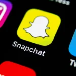 Snapchat logo on a smartphone screen as Australia introduces new age verification rules for users under 16