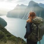 Tokyo skyline at night with neon lights and busy streets, a top destination for safe solo travel.