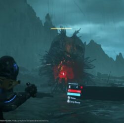 Death Stranding 2: On the Beach promotional image featuring Sam Porter Bridges walking across a post-apocalyptic landscape, hinting at the newly leaked PC version.