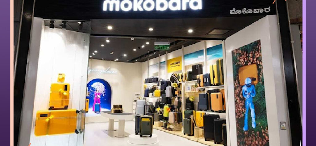 Mokobara luggage and travel accessories displayed, showcasing sleek, minimalist design, vibrant interiors, and premium features like reinforced shells and Japanese wheels.