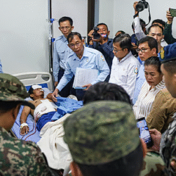 Injured Thai soldier being evacuated by military personnel after border clashes between Thailand and Cambodia in Sisaket province on December 7, 2025.