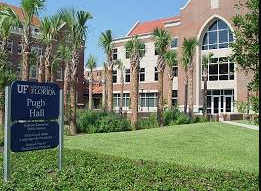 University of Florida campus building with students walking; represents new neutrality policy limiting leadership social media statements