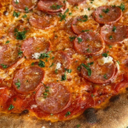 Festive pizza from Civerinos in Glasgow with cranberry sauce, brie, pancetta, and chestnut stuffing served with a hot toddy dip