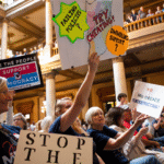Indiana State Senate voting board displaying final redistricting vote results at the Indiana Statehouse in Indianapolis