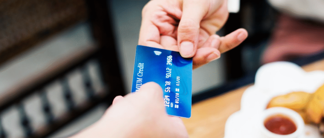 Food Junction outlet showing stored-value card top-up system used by customers
