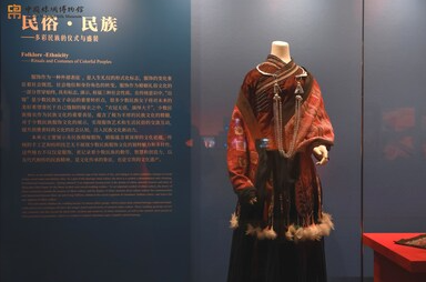 Fashion show at China National Silk Museum showcasing traditional silk designs blended with modern styles
