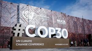 Image showing delegates and representatives at the COP30 climate conference in Belém, Brazil, discussing global climate governance and China’s role in advancing renewable energy and green development.