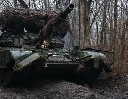 Image of global defense company exhibition showcasing military equipment, symbolizing record-high arms revenue worldwide as reported by SIPRI for 2024.