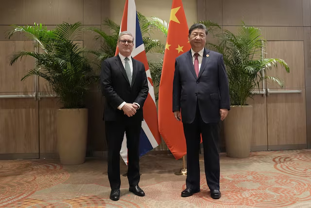 British Prime Minister Keir Starmer shaking hands with Chinese President Xi Jinping during 2026 visit to Beijing