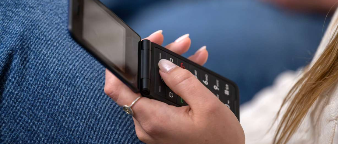A person practicing mindful breathing in a calm, device-free environment, symbolizing somatic wellness and digital minimalism.